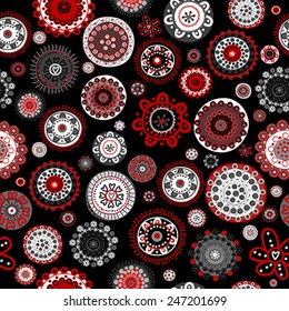 Seamless with doodle flowers over black background