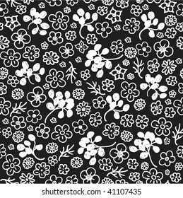 Seamless doodle flowers pattern in vector