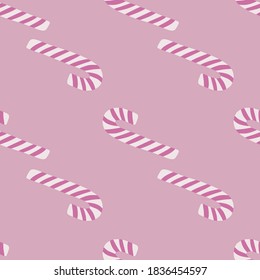 Seamless doodle pattern with christmas lolypop elements. Sweet stylized new year print in light lilac background. Backdrop for fabric design, textile print, wrapping, cover. Vector illustration.