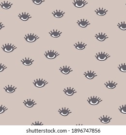Seamless doodle pattern with eyes on a beige background. Vector funny hand drawn background.