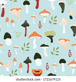 Seamless doodle pattern with forest mushrooms. Hand drawn vector illustration.