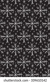 Seamless doodle pattern with snowflakes on a dark background for your creativity