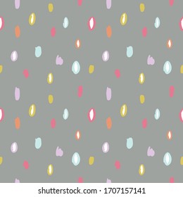 Seamless Doodle vector hand-painted pattern. Stylish multicolored geometric circles and ovals in a delicate color scheme. Suitable for Wallpaper, textiles, and other design materials.
