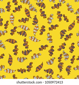 Seamless Doodles yellow, orange and black on colors. Vector. Vintage. Stylish fabric pattern.