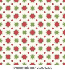 Seamless dot pattern for Christmas. Red and green dots and circles on white background.