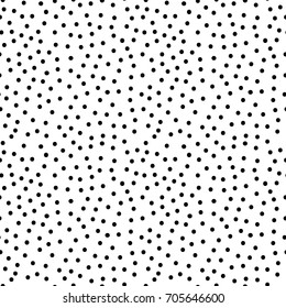 Seamless dotted pattern. Doodle dot texture. Abstract background with chaotic dots. Simple minimalistic graphic design.