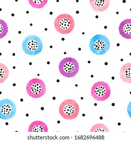 Seamless dotted pattern with pink, blue and purple circles. Vector abstract background