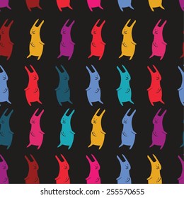 Seamless Easter background with colorful bunnies.