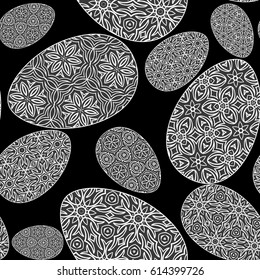 Seamless easter holiday ornament. Vector pattern with lace ornamental eggs. Design for greeting card, fabric print, cover or page for scrapbooking, gift wrap. black and white color background