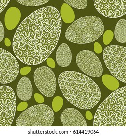 Seamless easter holiday ornament. Vector pattern with lace ornamental eggs. Design for greeting card, fabric print, cover or page for scrapbooking, gift wrap. green color background