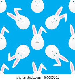 Seamless easter pattern with bunnies in the form of egg on blue background