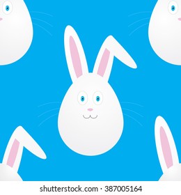 Seamless easter pattern with bunnies in the form of egg on blue background