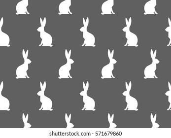 Nahtlose Ostermuster. Farbige Saisonstruktur mit süßen Kaninchen. Keilende Frühlingshintergrund. Pauschalpapier, Vektordesign