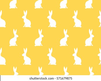 Seamless Easter pattern. Colorful season texture with cute rabbits. Tiling spring background. Holiday wrapping paper, vector design