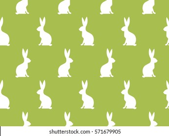Seamless Easter pattern. Colorful season texture with cute rabbits. Tiling spring background. Holiday wrapping paper, vector design