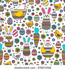 Seamless easter pattern with doodle elements. Bunny, eggs, hen, chicken, carrot with hand drawn ornament. Cute background for childish design.