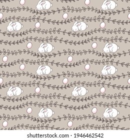 Seamless Easter pattern with floral motifs, easter eggs and bunny. Vintage spring easter holiday pastel background. Hand drawn eggs, bunny, flowers, endless branches.Cute Easter illustration. 