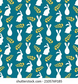 Seamless Easter pattern with white rabbits and decorative yellow leaves. Pattern on a blue background for printing on paper, fabric. Ornament in a square format.