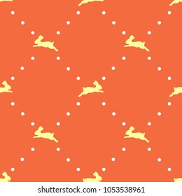 Seamless Easter themed pattern. Hopping bunnies on orange background