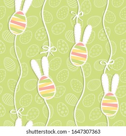 seamless eastern pattern with eggs with ornaments and bunnyeggs on ribbons