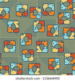 Seamless editable pattern consisting of four varicoloured cobblestones are stacked in the form of a square. On the background large squares consisting of diagonal strips of different directions.