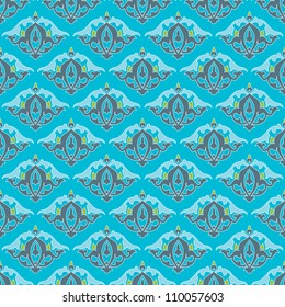 Seamless and elegant Baroque pattern with swirls on a deep blue background
