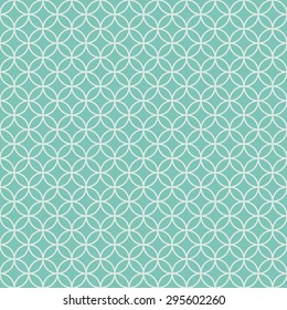 Seamless elegant geometric pattern of circles on a mint blue background