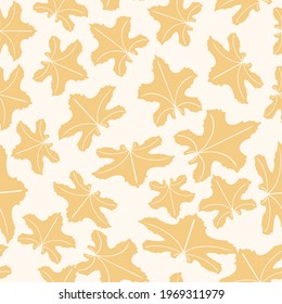 Seamless elegant pattern with golden maple hand drawn leaves on a beige background. The pattern can be used for wrapping papers, invitation cards, wallpapers, covers, textile prints. Vector