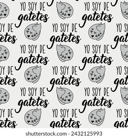 Seamless elegant pattern with Spanish lettering. I am from cats - in Spanish. Print for textile, wallpaper, covers, surface. For fashion fabric. Yo soy de gatetes.