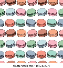 Seamless endless pattern with assorted varicolored macaroons on white background.