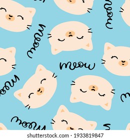 Seamless endless pattern with cute kitten faces. Vector print on a blue background with the words meow