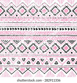 Seamless ethnic background in pink, white and black colors. Vector illustration texture.