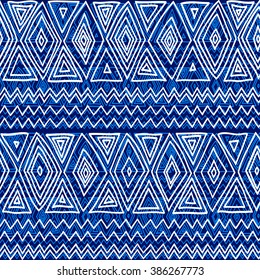 Seamless ethnic geometric pattern. Blue and white graphics, diamonds, triangles and zigzags on a white background, folk motives.