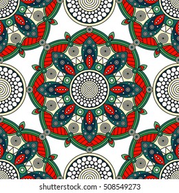 Seamless ethnic mandala pattern. Decorative ornamental print with Oriental art motifs in traditional Christmas palette of bright greens, red, white & pastel yellow.