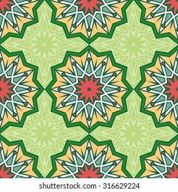 Seamless ethnic oriental pattern. Colorful folkloric textile design on green background.