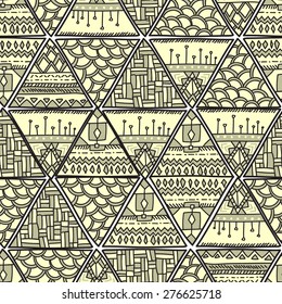 Seamless ethnic pattern of bizarre triangle. Vector illustration handmade.