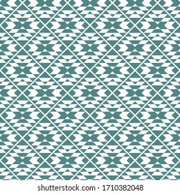 Seamless ethnic pattern. Chevrons, triangles, trapezoids ornament. Curves, polygons backdrop. Folk wallpaper. Ethnic background. Tribal motif. Ancient mosaic. Embroidery ornate. Textile print. Vector.