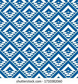 Seamless ethnic pattern. Chevrons, triangles, trapezoids ornament. Curves, polygons backdrop. Folk wallpaper. Ethnic background. Tribal motif. Ancient mosaic. Embroidery ornate. Textile print. Vector.