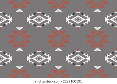 Seamless ethnic pattern design. traditional patterned carpets It is a pattern geometric shapes. Create beautiful fabric patterns. Design for print. Using in the fashion industry.