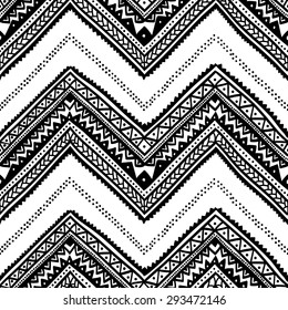 Seamless ethnic pattern drawn by hand. Black and white vector illustration. Horizontal geometric strip. Zigzag.