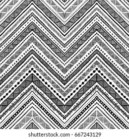 Seamless ethnic pattern drawn by hand. Black and white vector illustration. Horizontal geometric strip. Chevron ornament, zigzag.