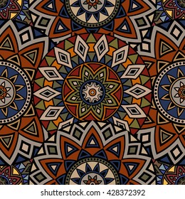 Seamless ethnic pattern with floral motives. Mandala stylized print template for fabric and paper. Boho chic design. Summer fashion.