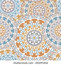 Seamless ethnic pattern with floral motives. Mandala stylized print template for fabric and paper. Boho chic design. Summer fashion.