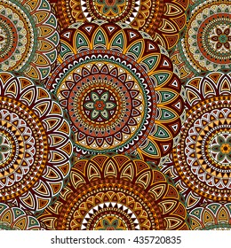 Seamless ethnic pattern with floral motives. Mandala stylized print template for fabric and paper. Boho chic design. Summer fashion.