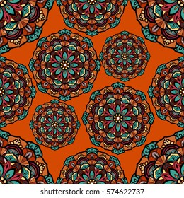 Seamless ethnic pattern with floral motives. Mandala stylized print template for fabric and paper. Indian or Arabic motive. Boho festival style.
