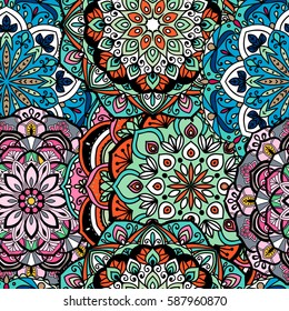 Seamless ethnic pattern with floral motives. Mandala stylized print template for fabric and paper. Indian or Arabic motive. Boho festival style.
