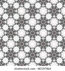 Seamless ethnic pattern in grey colors with circles and triangles