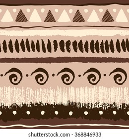 Seamless ethnic pattern with grunge hand drawn elements, triangles, spirals, dots and stripes.