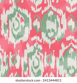 Seamless ethnic pattern with grunge textured tie-dye ikat background elements in pink, green and cream