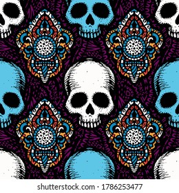 Seamless ethnic pattern with hand drawn skulls. Vector Illustration